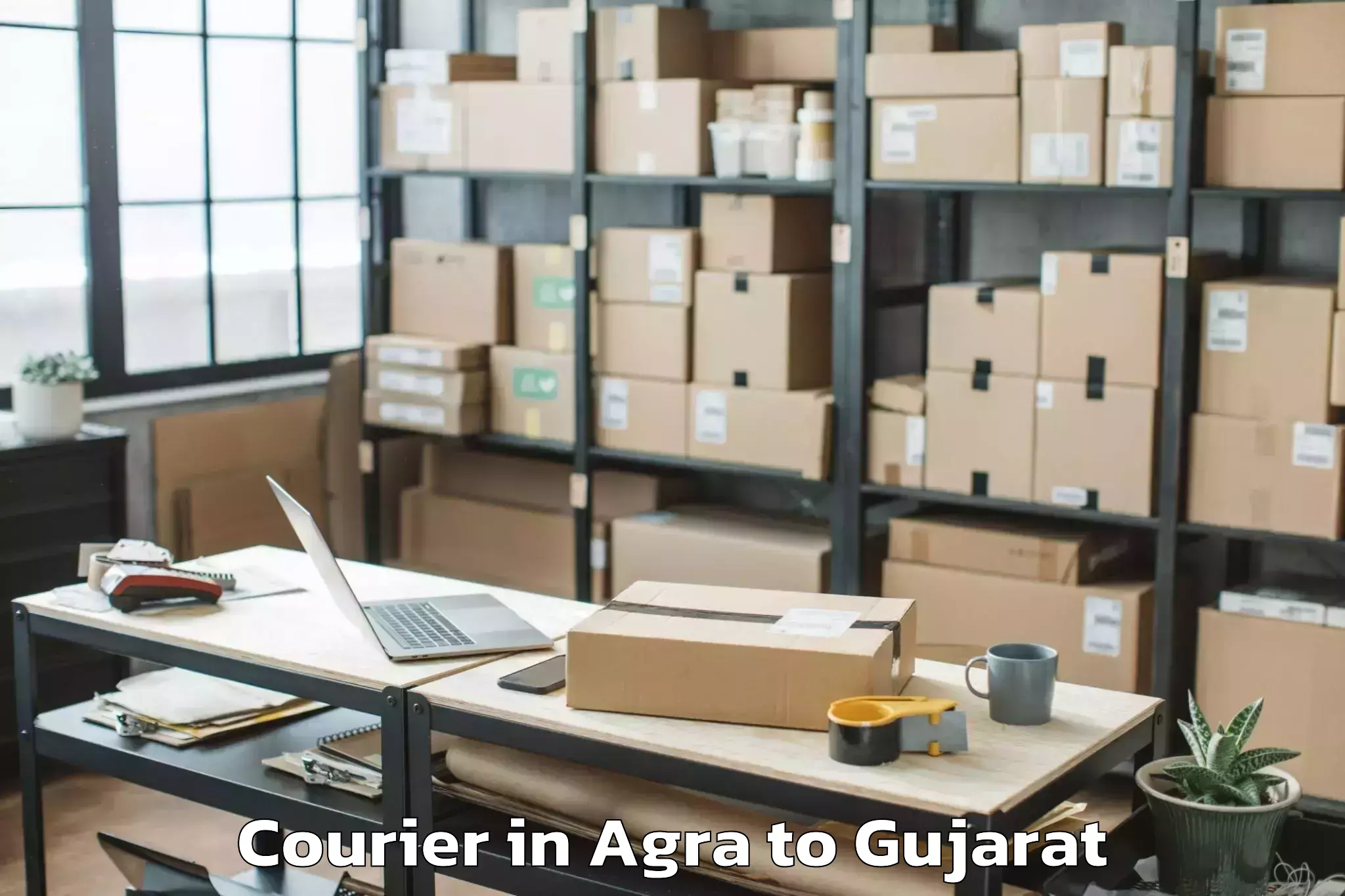 Reliable Agra to Hemchandracharya North Gujarat Courier